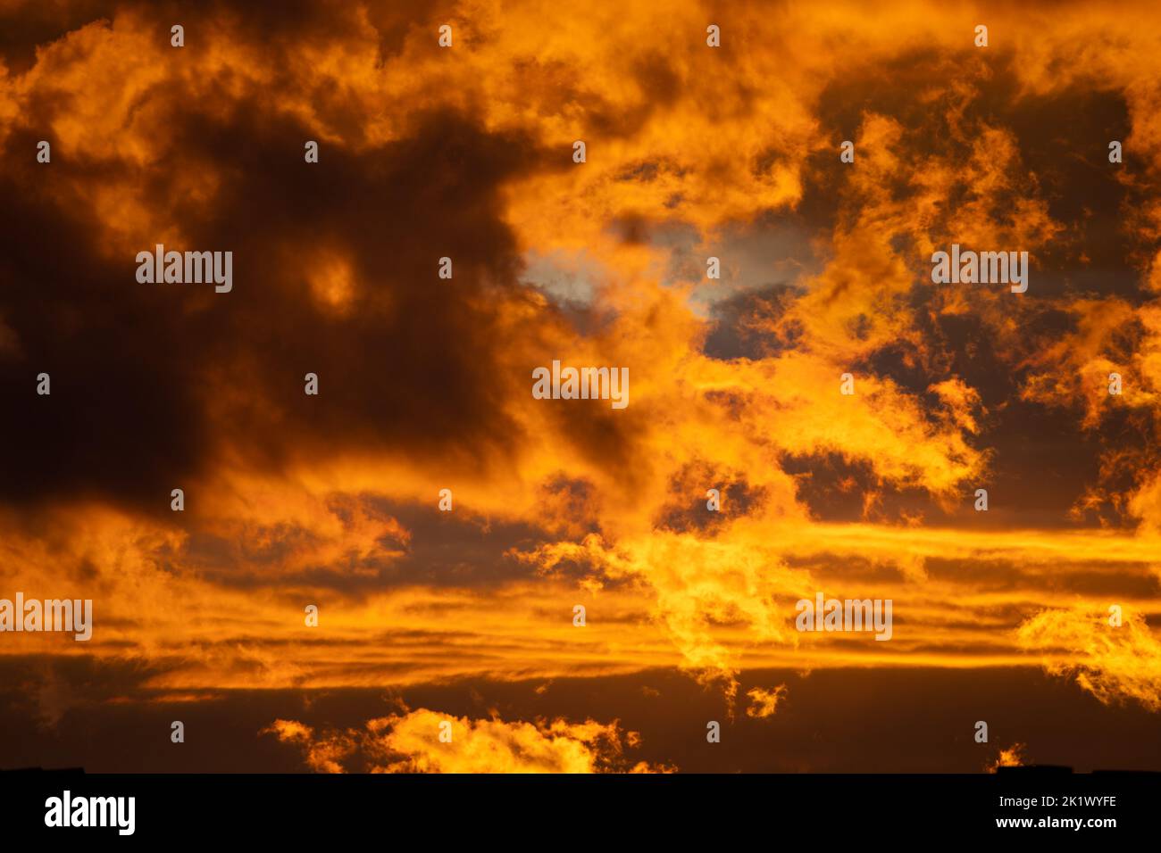 Evening vibrant cloudscape at sunset time. Colourful theme. Stock Photo