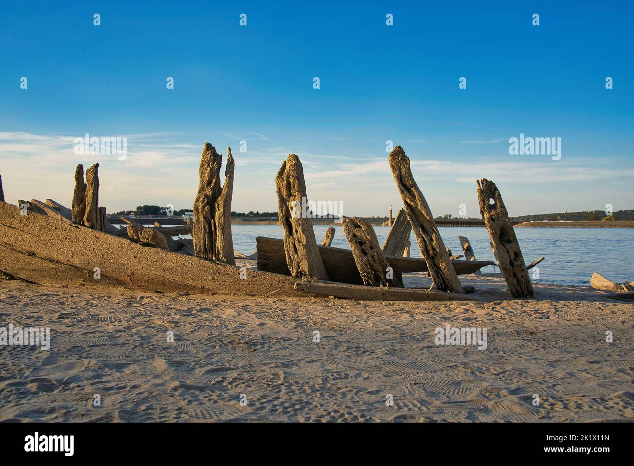 An old wrecked boat in the seashore Stock Photo - Alamy