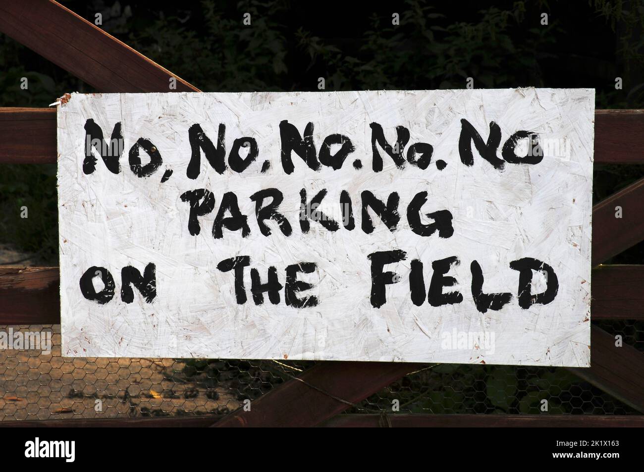 No parking on the field sign Stock Photo