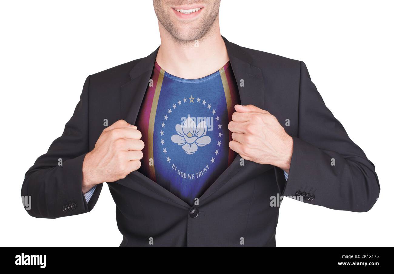 Businessman showing shirt with the flag of Mississippi, isolated Stock Photo