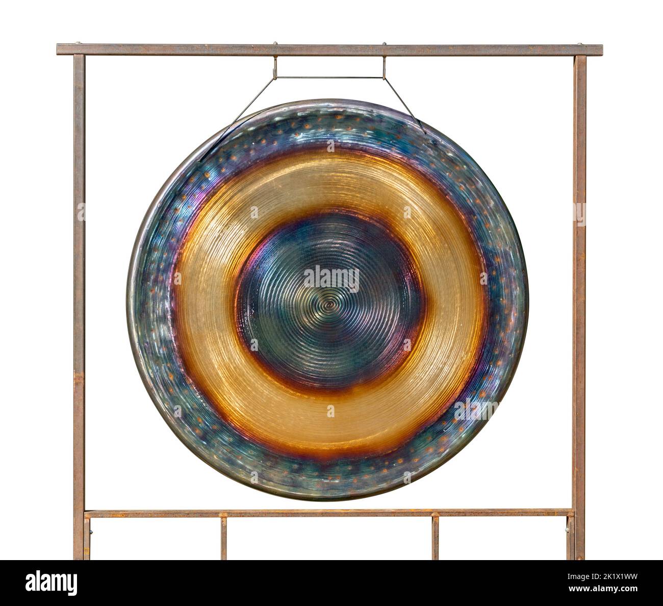 Colorful metallic gong hanging in a frame isolated in white back Stock Photo