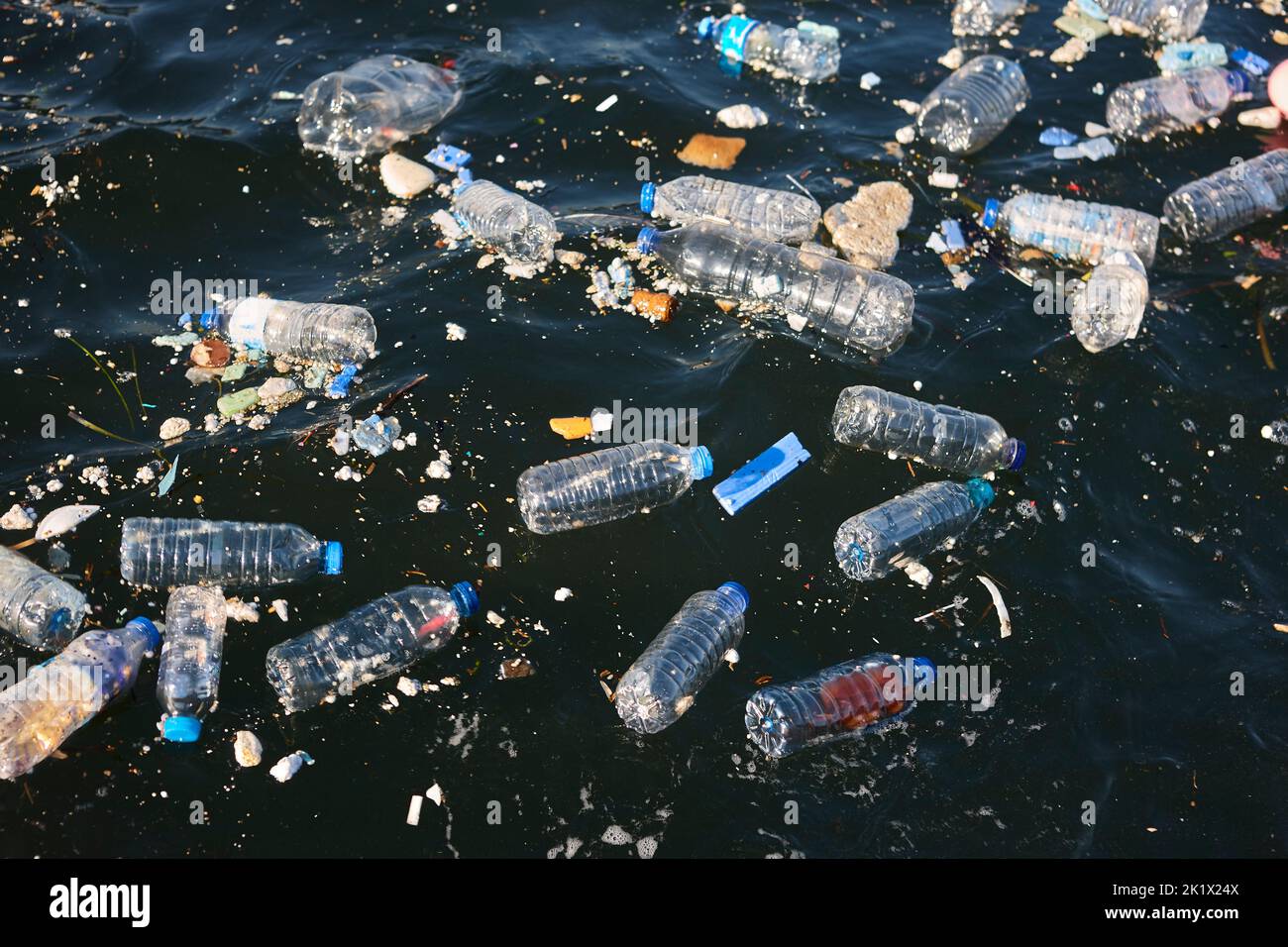 Plastic bottles in the sea. Garbage and pollution. Environmental issues Stock Photo