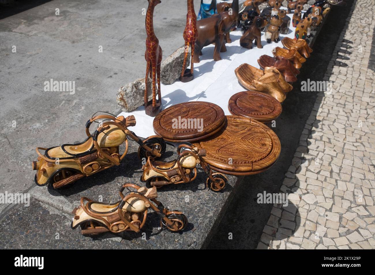 carved wooden items for sale on Avenida do Mar in Funchal Madeira Stock