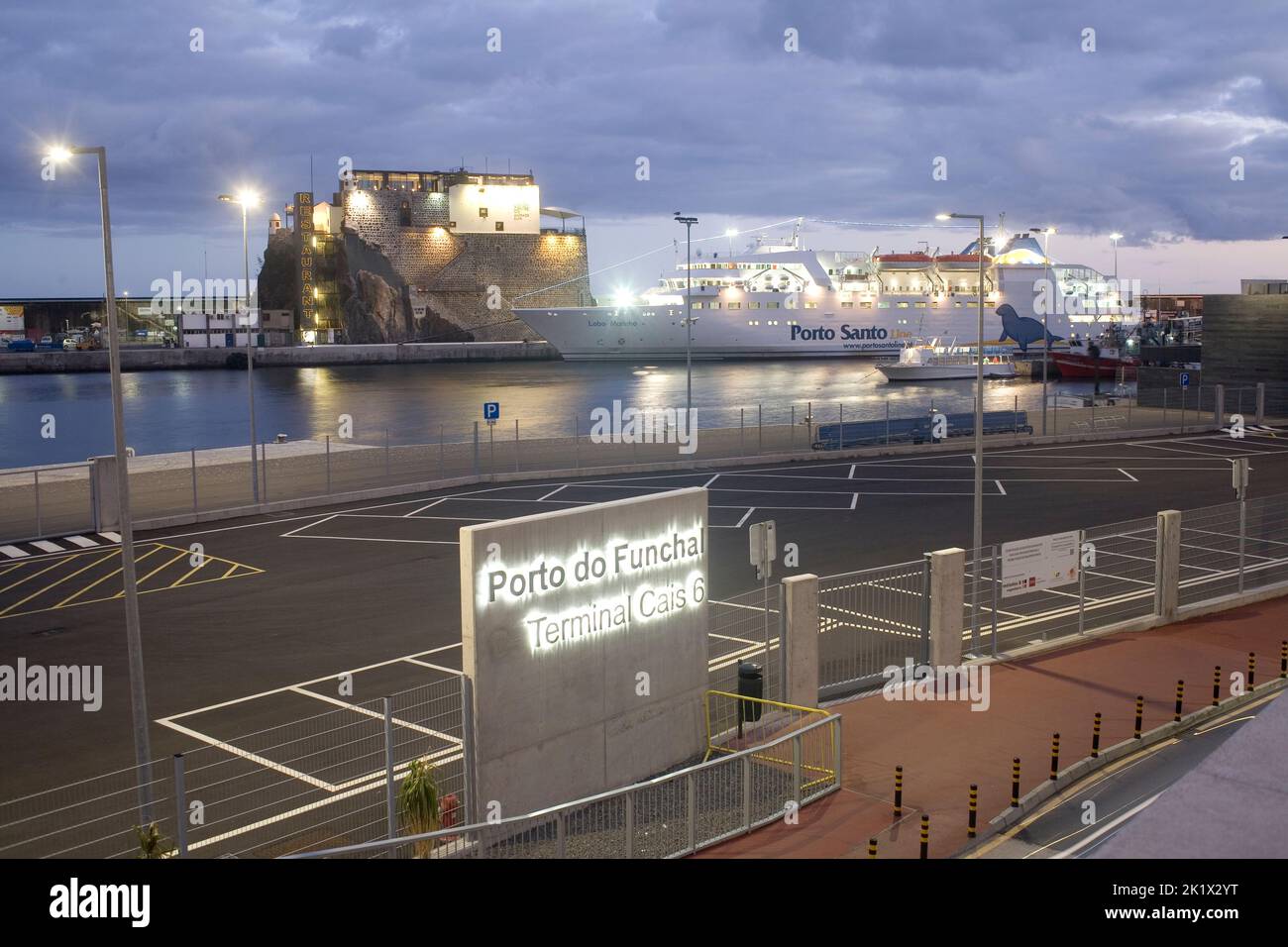 port of Funchal Madeira with Porto Santo ferry docked on a summer evening Stock Photo