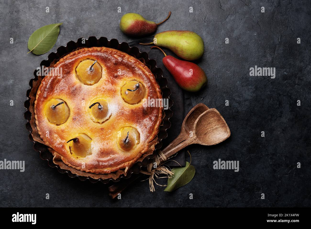 Homemade pear pie. Fruit tart with seasonal fruits. Flat lay with copy space Stock Photo