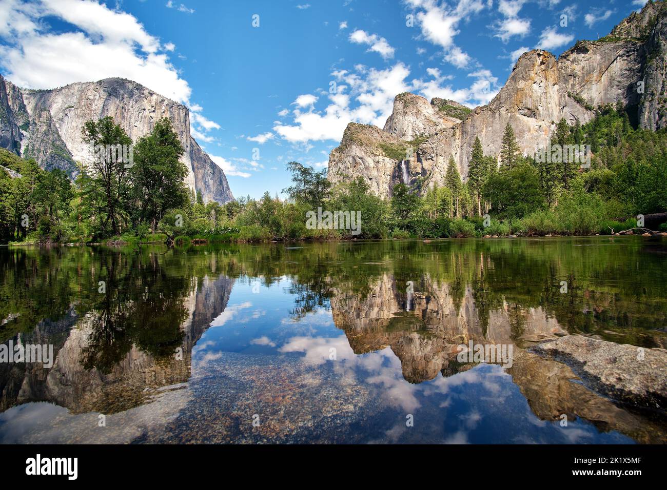 A beautiful view of Yosemite Valley with El Capitan, Sentinel Rock, Cathedral Rocks, and Bridalveil Fall, California, USA Stock Photo