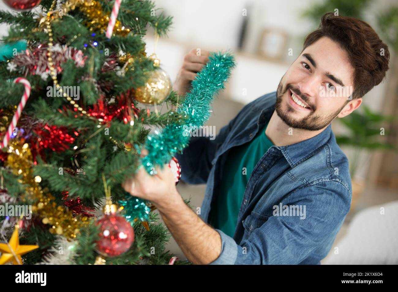 Man stands near tree hi-res stock photography and images - Alamy