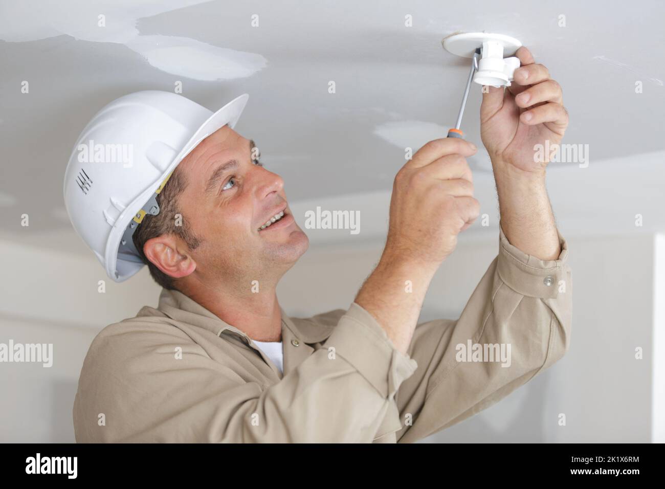 Screwing the socket hi-res stock photography and images - Alamy