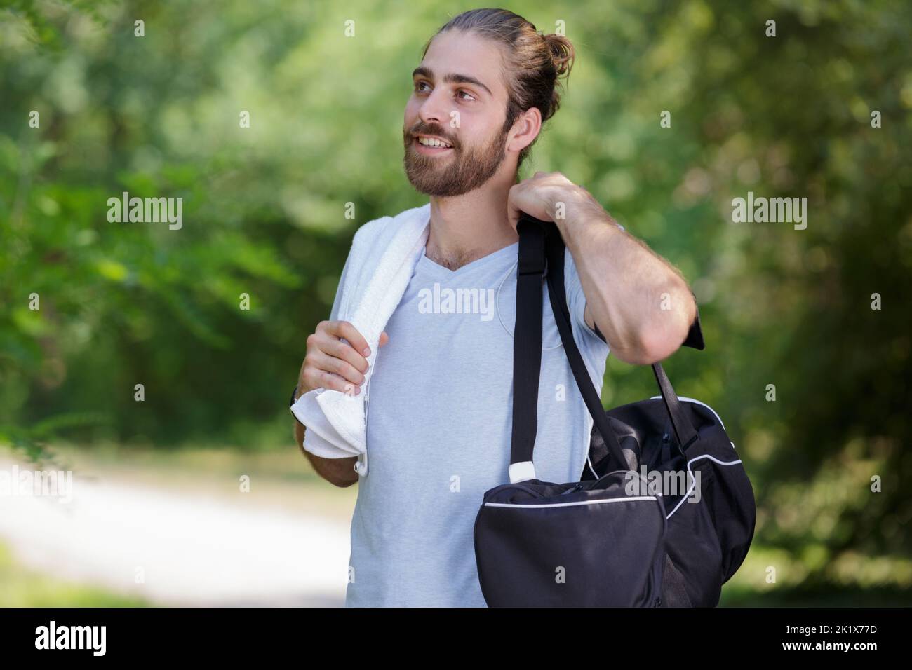 hiking man portrait with backpack walking in nature Stock Photo - Alamy
