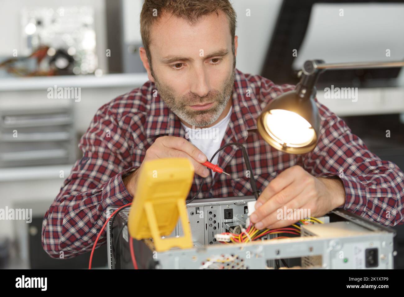 electrical engineer fixing motherboard problem Stock Photo Alamy