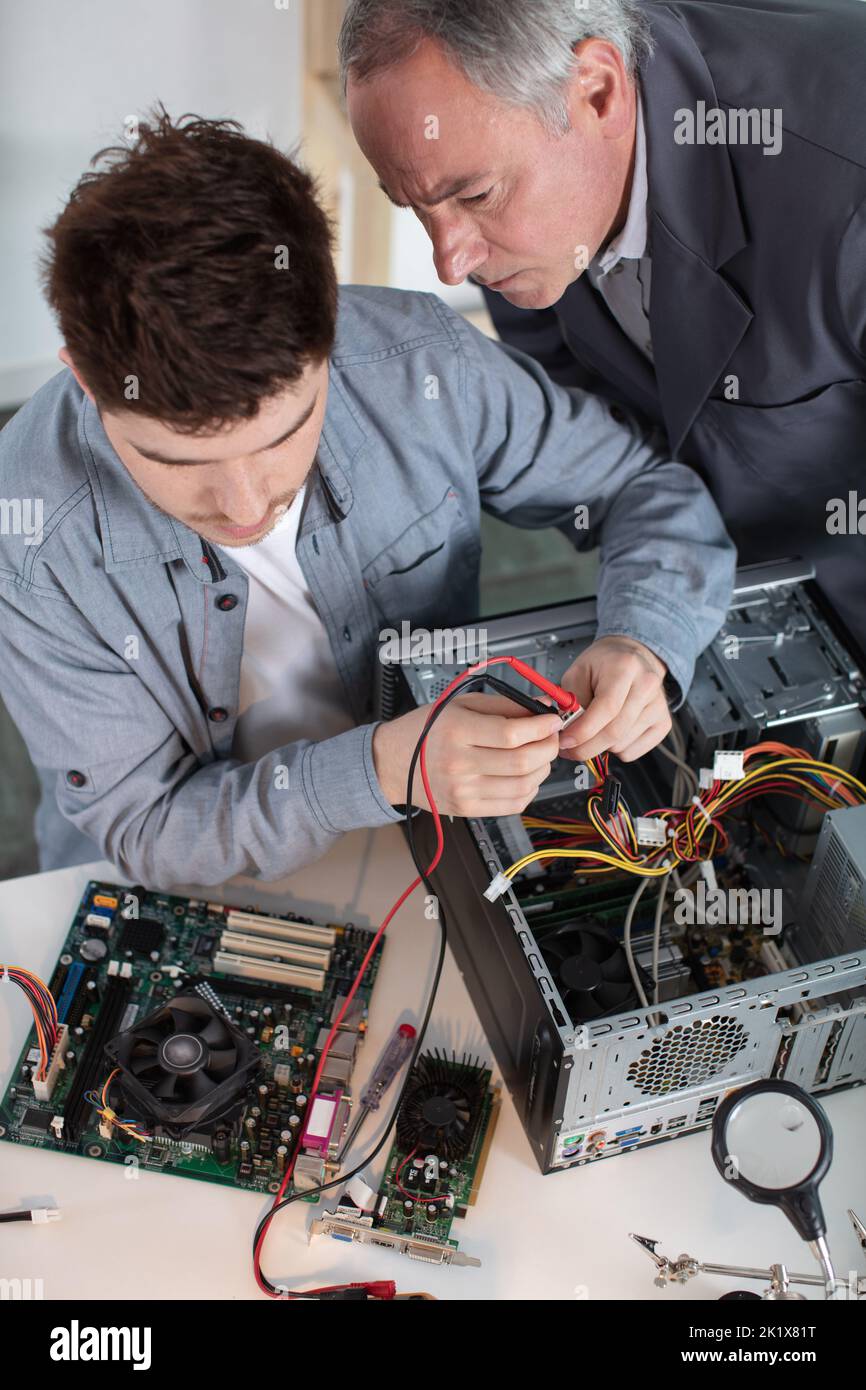 two it specialists working in the office Stock Photo