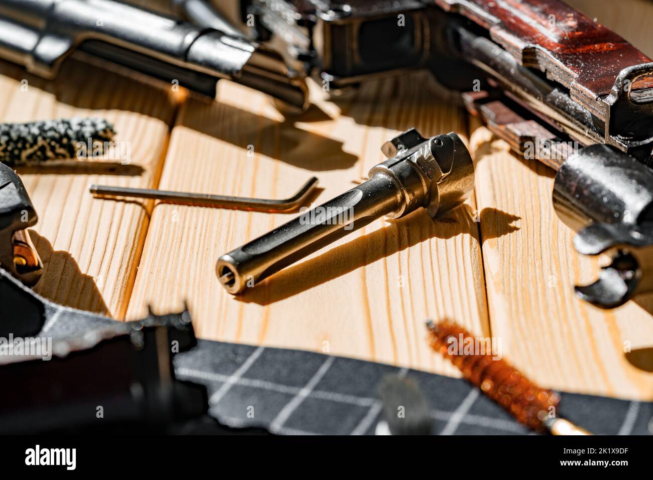 Gunsmith's working table for gun cleaning and maintaining Stock Photo