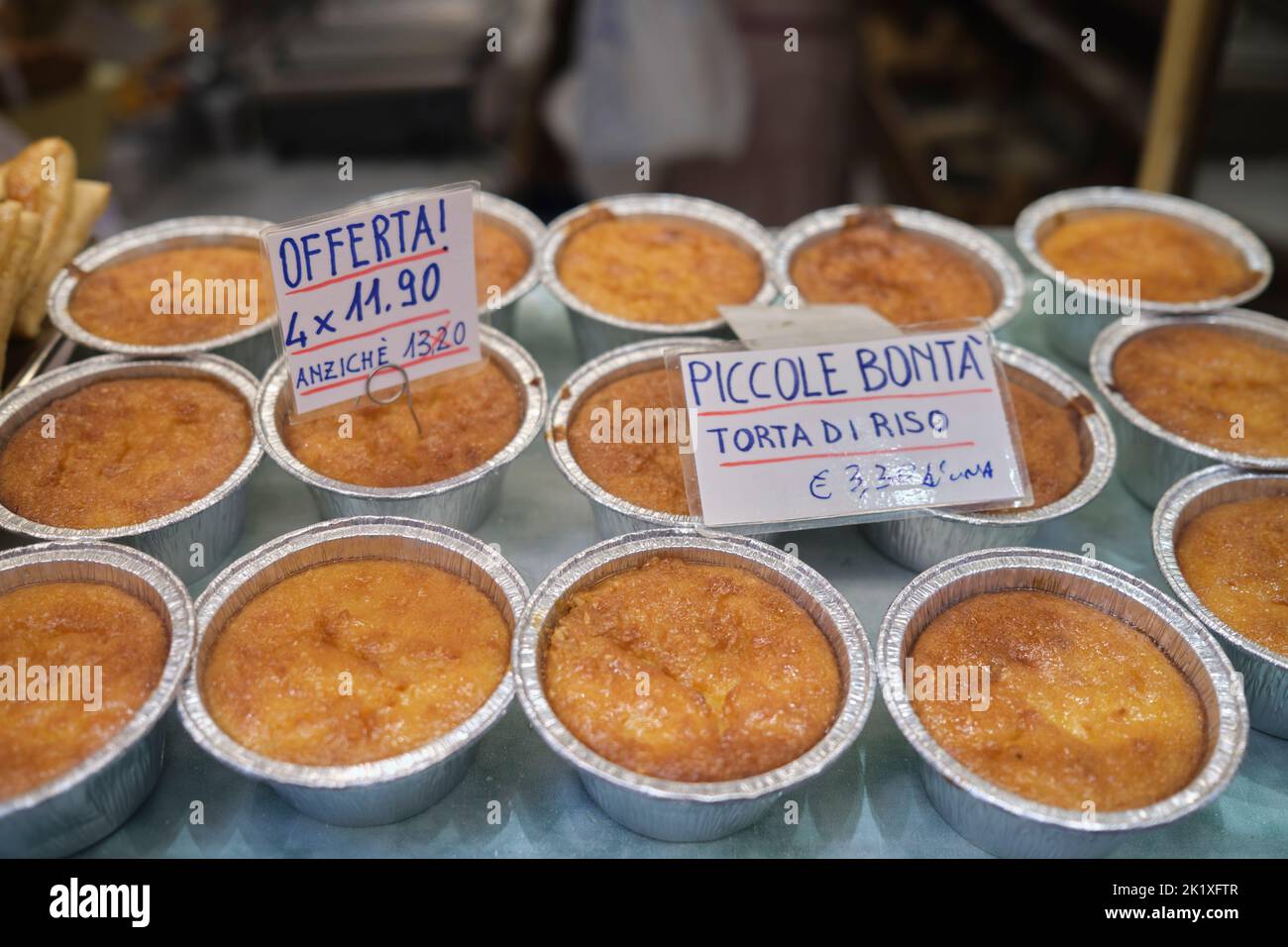 Local Rice Cake or Torta de Riso in Shop Window Display in the Quadrliatero Bologna Italy Stock Photo