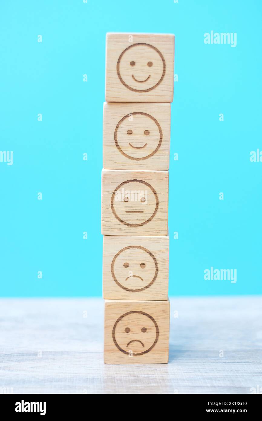emotion face blocks on blue background. Service rating, ranking ...
