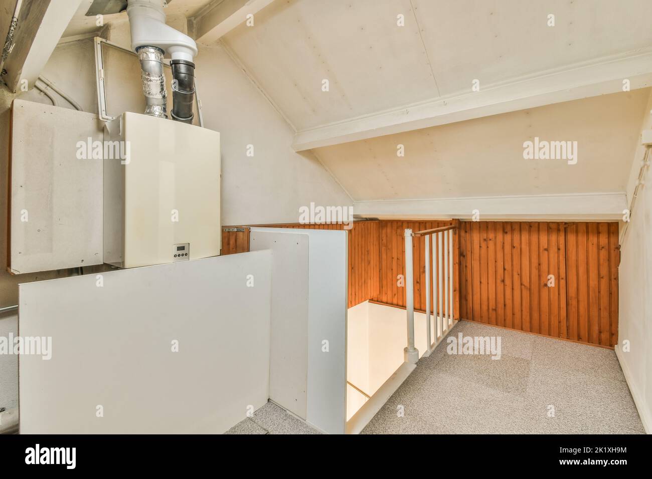 Boiler room of an apartment building with pipes and metering devices. A