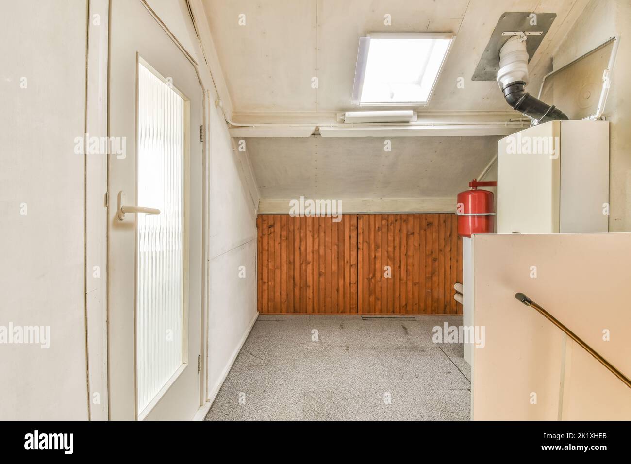 Boiler room of an apartment building with pipes and metering devices. A