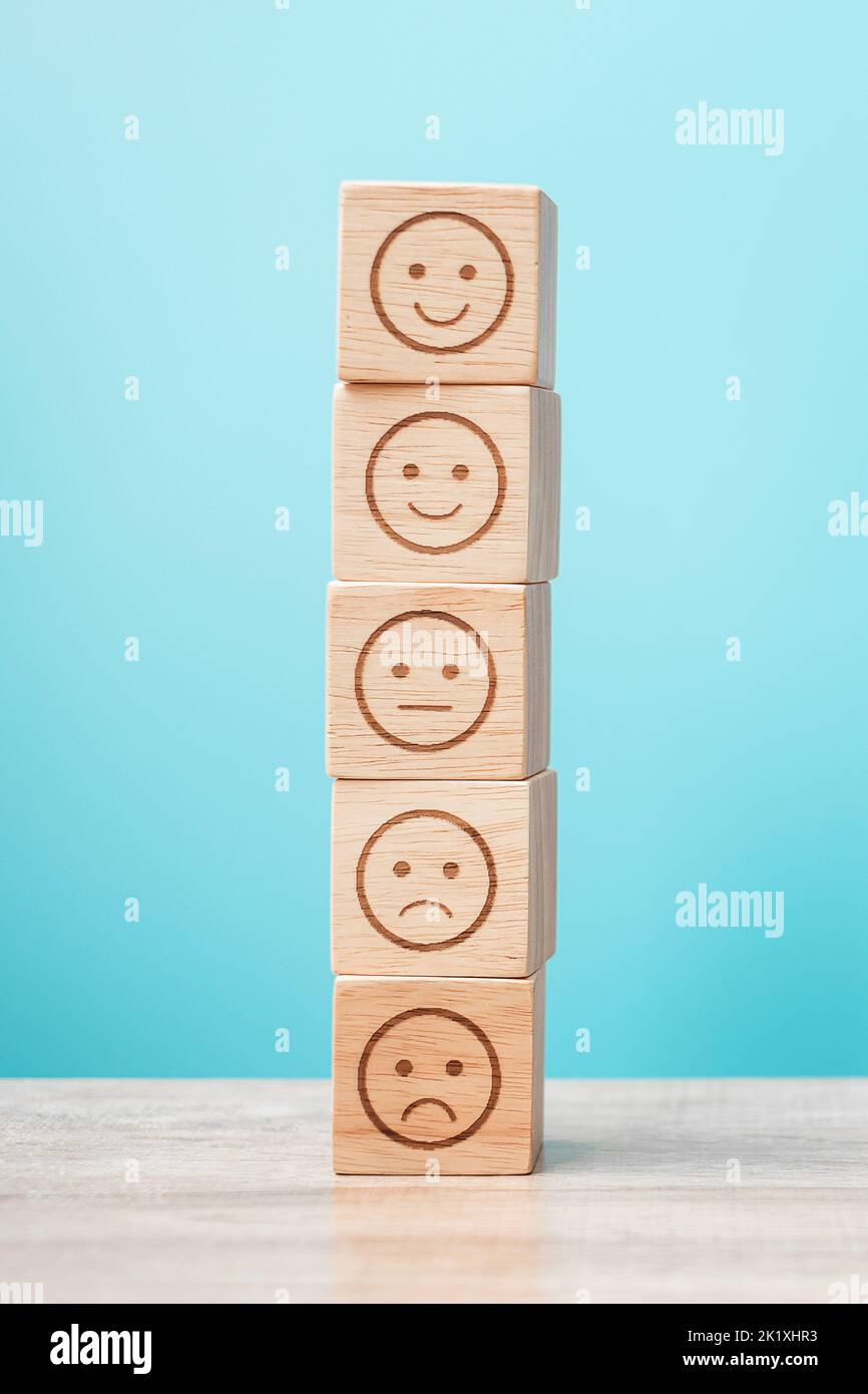 emotion face blocks on blue background. Service rating, ranking ...