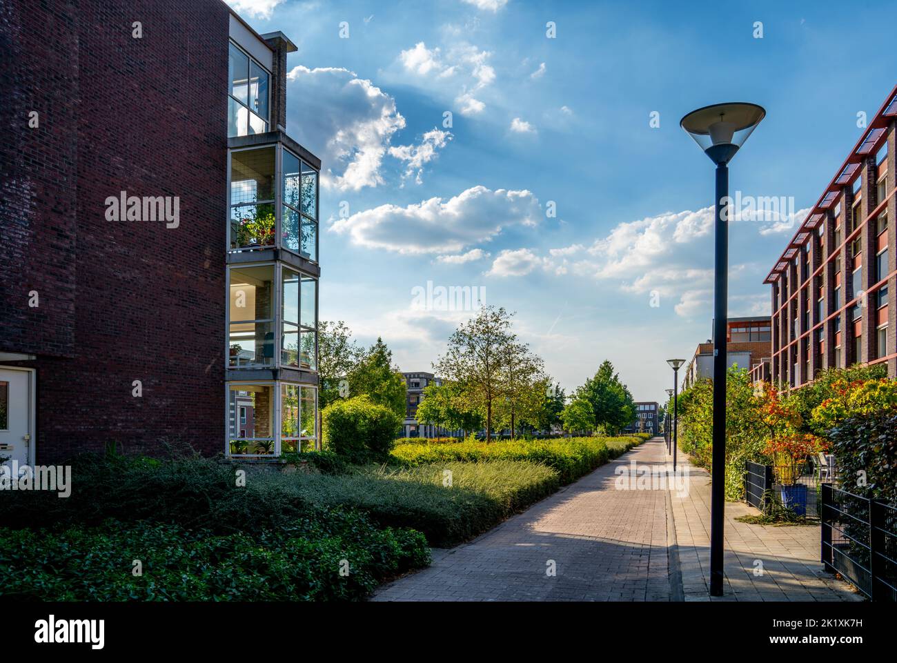 Street with park and apartments in Amersfoort, Netherlands Stock Photo