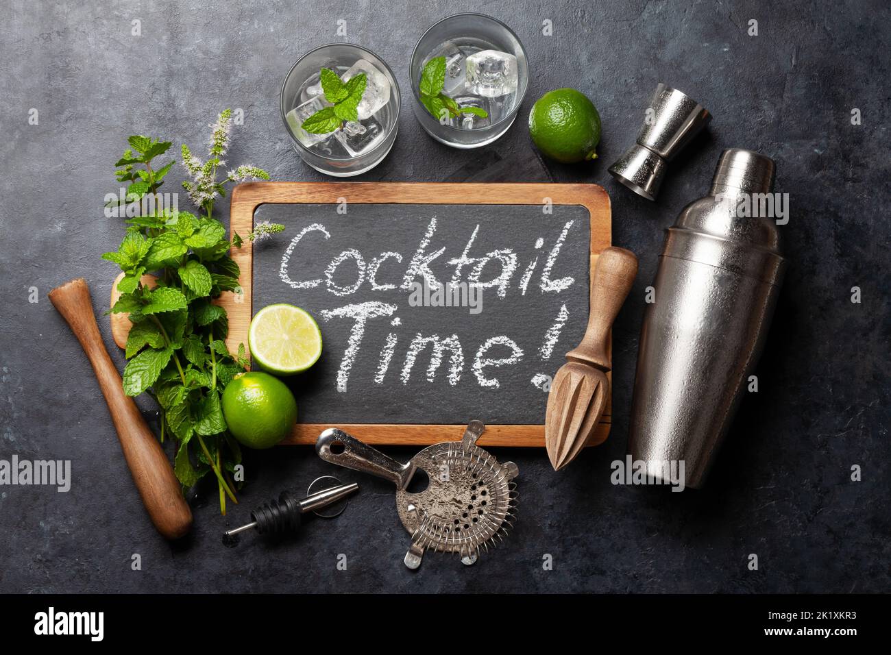 Mojito cocktail ingredients and drinks utensils. On stone table flat lay Stock Photo