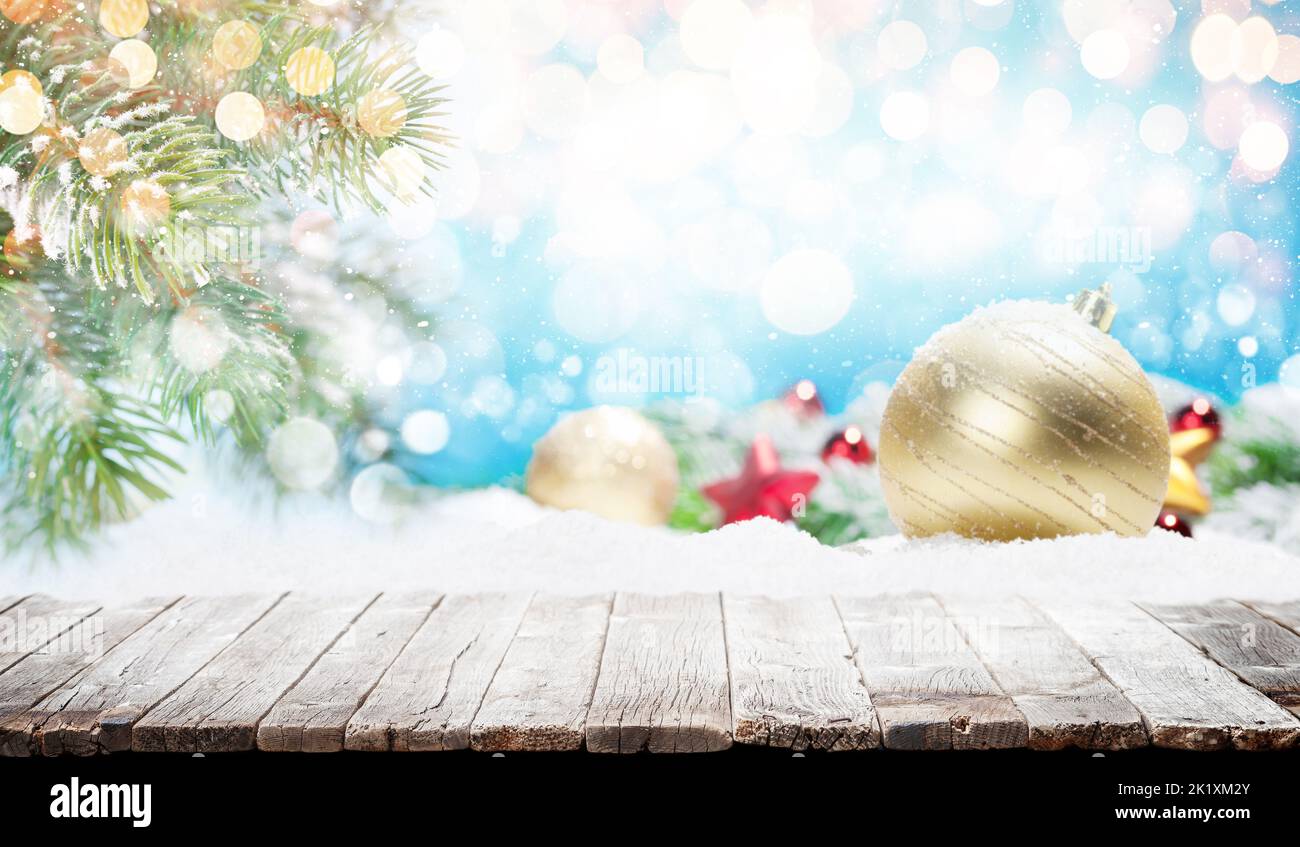 Christmas table background with winter bokeh backdrop. For display your product Stock Photo