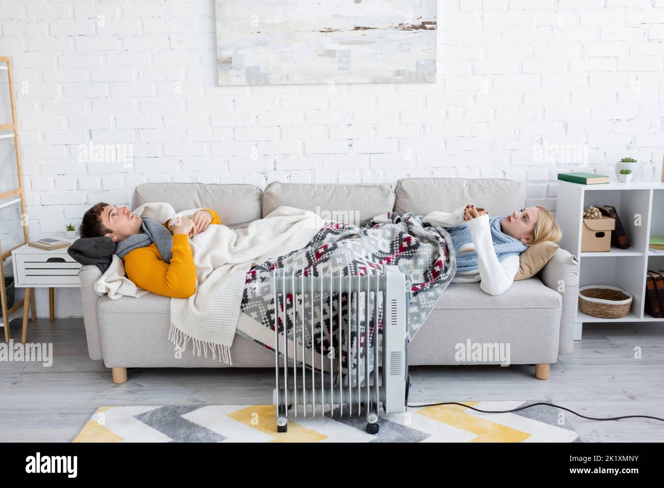 Man woman sofa radiator hi-res stock photography and images - Alamy