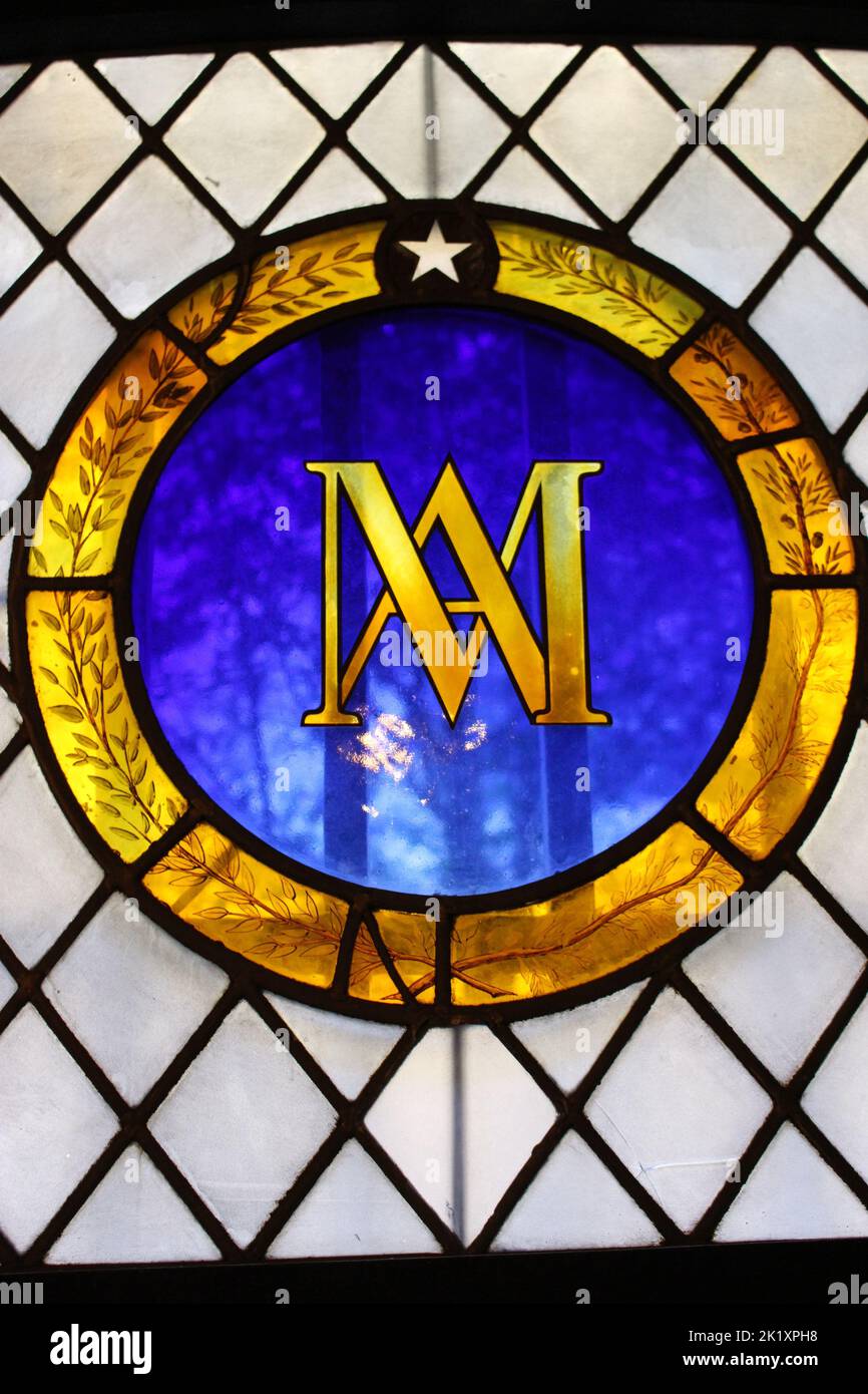 Marie Antoinette's symbol in the stain glass of her prison window (Conciergerie, Paris, France). This is the room she stayed in until her execution. Stock Photo