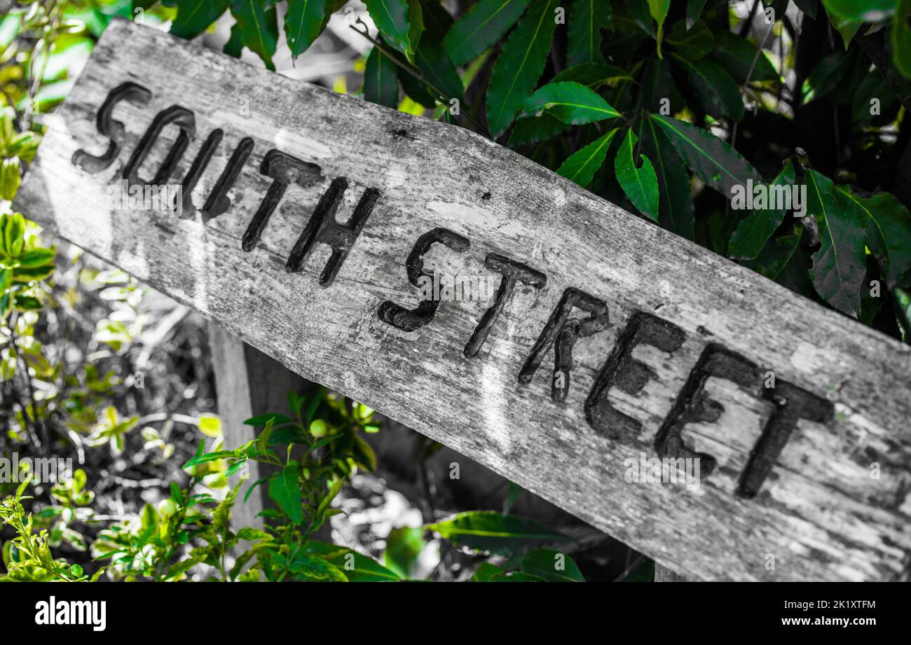 Close-up of Rustic Wooden South Street Sign. Stock Photo