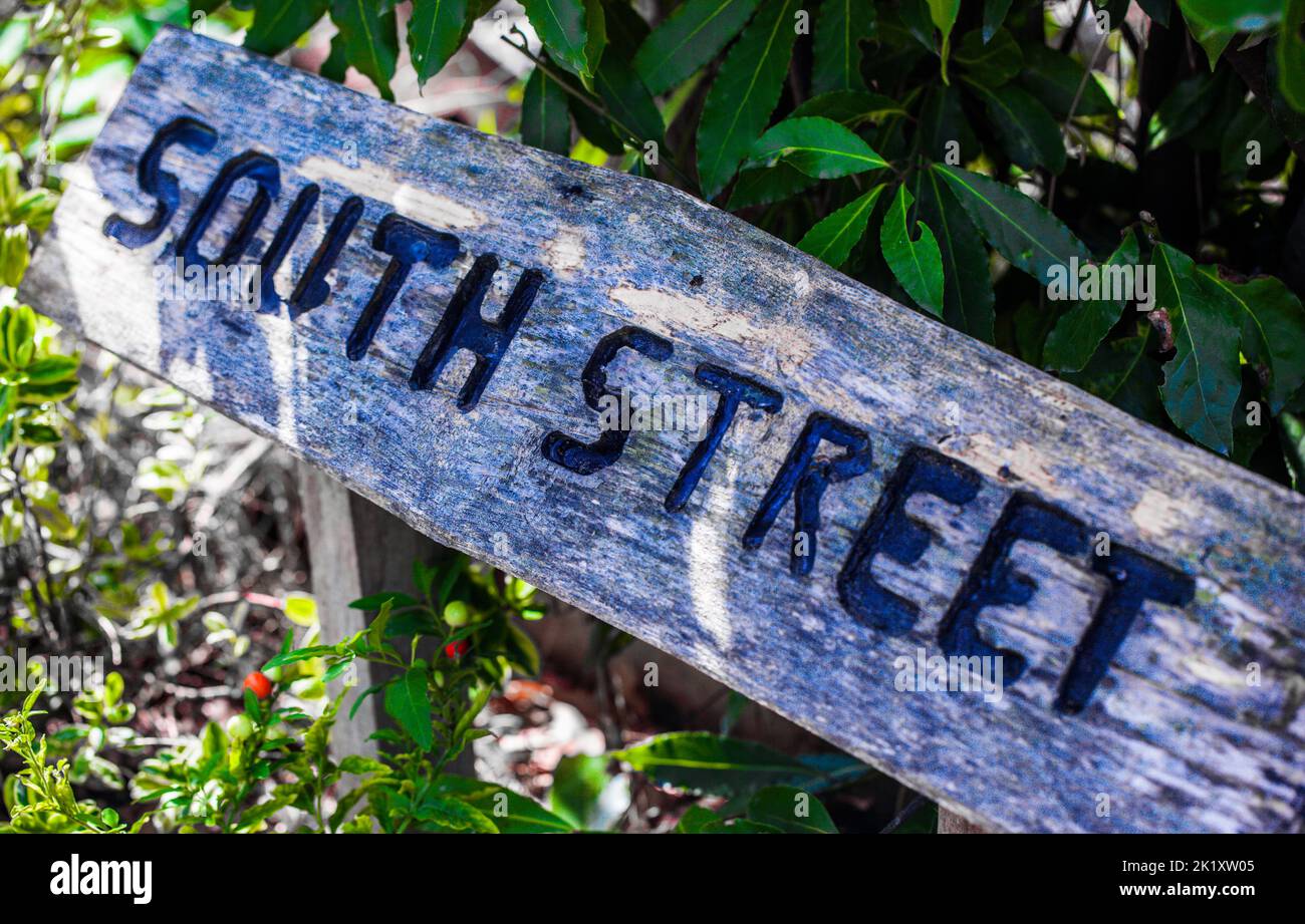 Close-up of Rustic Wooden South Street Sign. Stock Photo