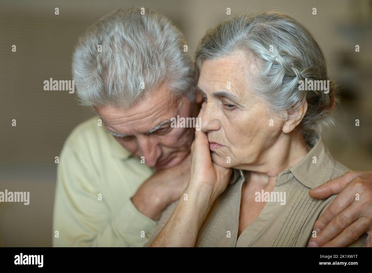 Portrait of a elderly couple being sad together Stock Photo