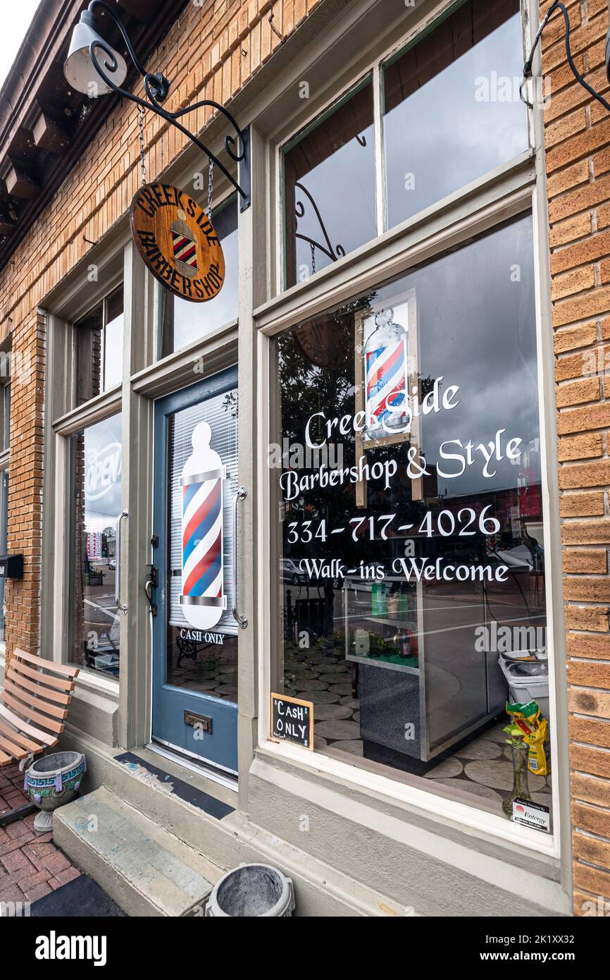 Prattville, Alabama, USA - Sept. 11, 2022: View of the exterior of CreekSide Barbershop, an old fashioned barber and small business in historic, downt Stock Photo