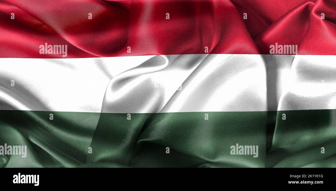 The flag of Hungary with realistic waving fabric design. Stock Photo
