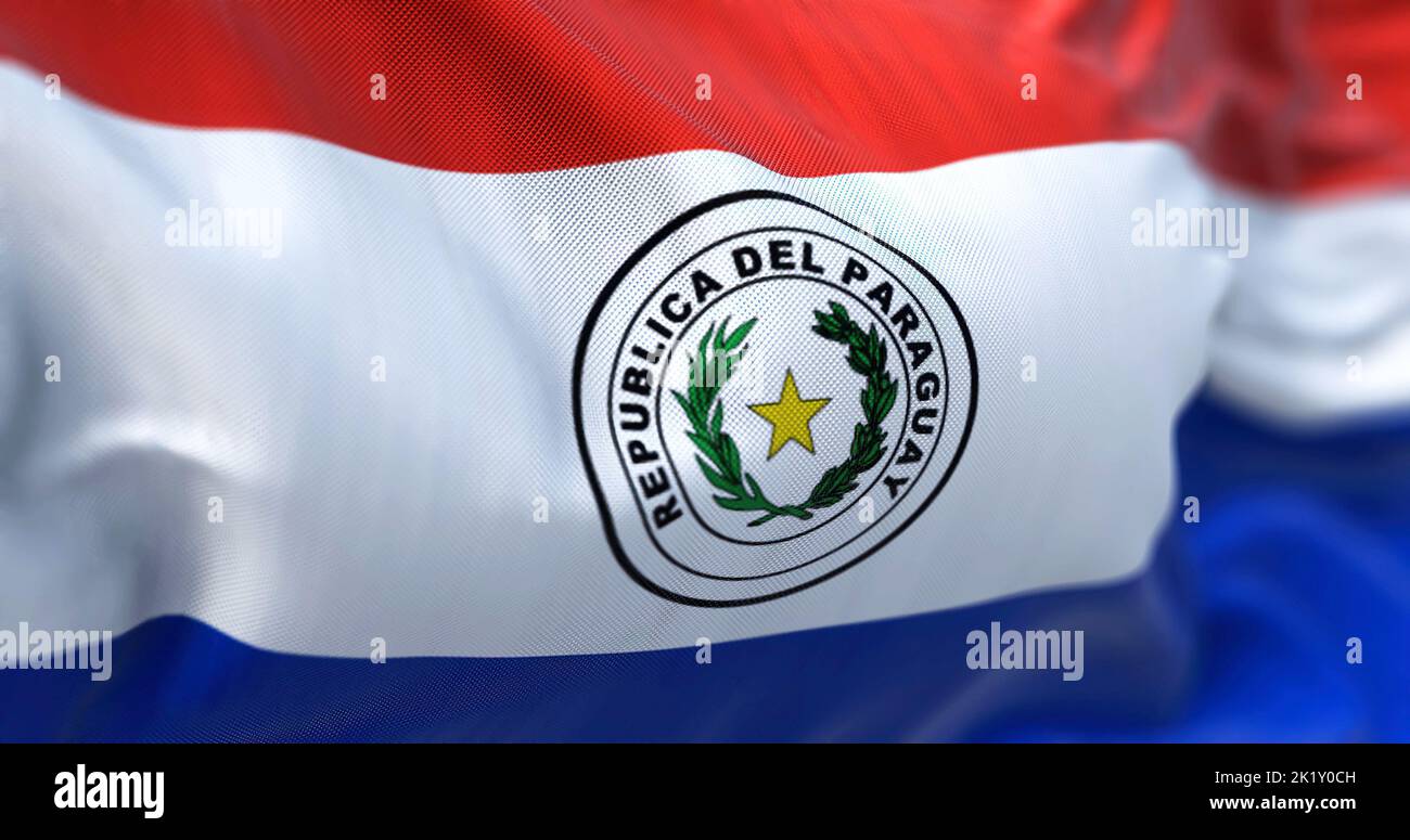 Close-up view of the Paraguay national flag waving in the wind. Republic of Paraguay is a landlocked country in South America. Fabric textured backgro Stock Photo