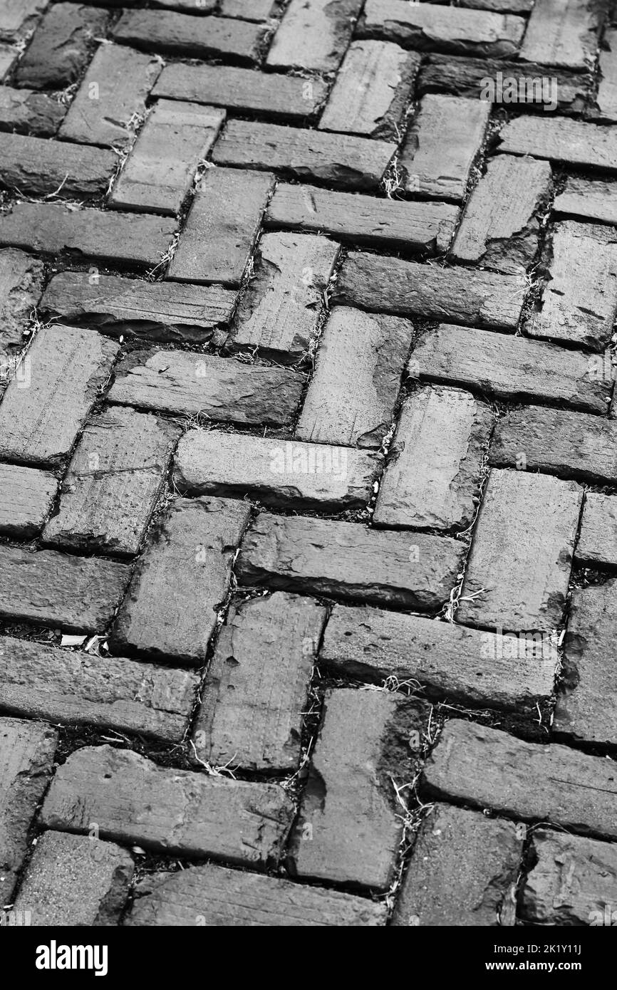 Traditional herringbone pattern laid on the vintage brick walk Stock