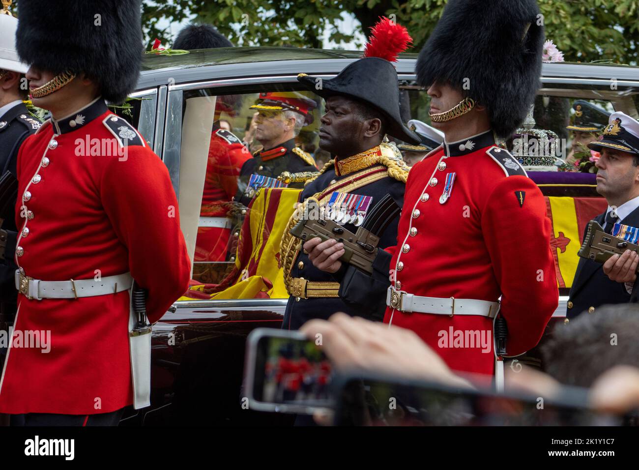 The queens funeral car at Windsor with soldiers walking beside it Stock