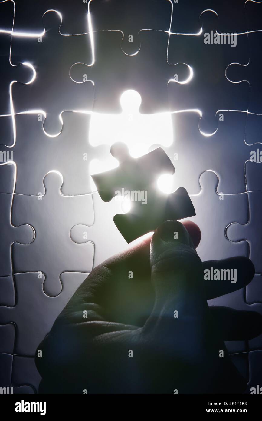 Everythings falling into place. a puzzle missing a single piece. Stock Photo