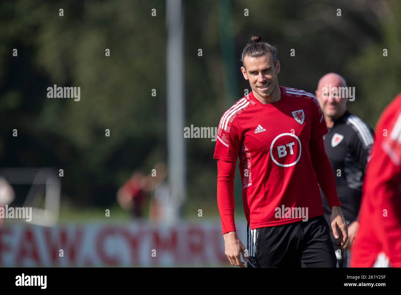 Hensol, Wales, UK. 21st Sep, 2022. Gareth Bale is watched by team coach Rob Page during Wales national football team training at Vale Resort ahead of UEFA Nations League matches against Belgium and Poland. Credit: Mark Hawkins/Alamy Live News Stock Photo