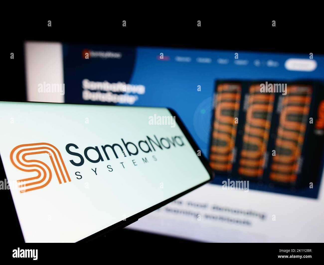 Mobile phone with logo of American AI company SambaNova Systems Inc. on screen in front of business website. Focus on left of phone display. Stock Photo