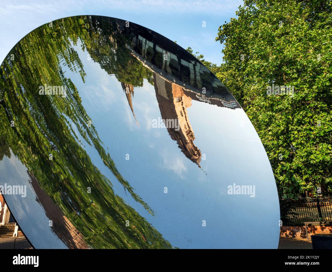 Albert Hall tower reflected in the Sky Mirror a sculpture by artist Anish Kapoor in Nottingham Nottinghamshire England Stock Photo