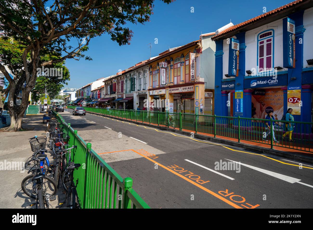 Colourful facades on heritage buildings lining a street in Little India. Singapore. Stock Photo