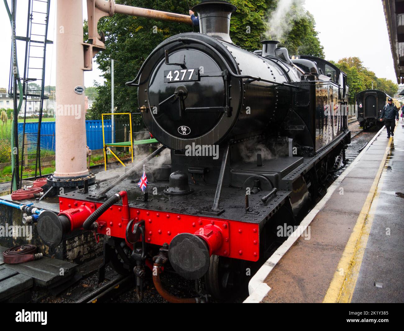 Engine No 4277 of Dartmouth Steam Railway in Paignton Railway Station Devon England UK getting ready to depart for journey to Dartmouth Stock Photo