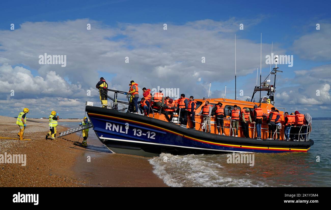 A group of people thought to be migrants are brought in to Dungeness, Kent, by the RNLI following a small boat incident in the Channel. Picture date: Wednesday September 21, 2022. Stock Photo