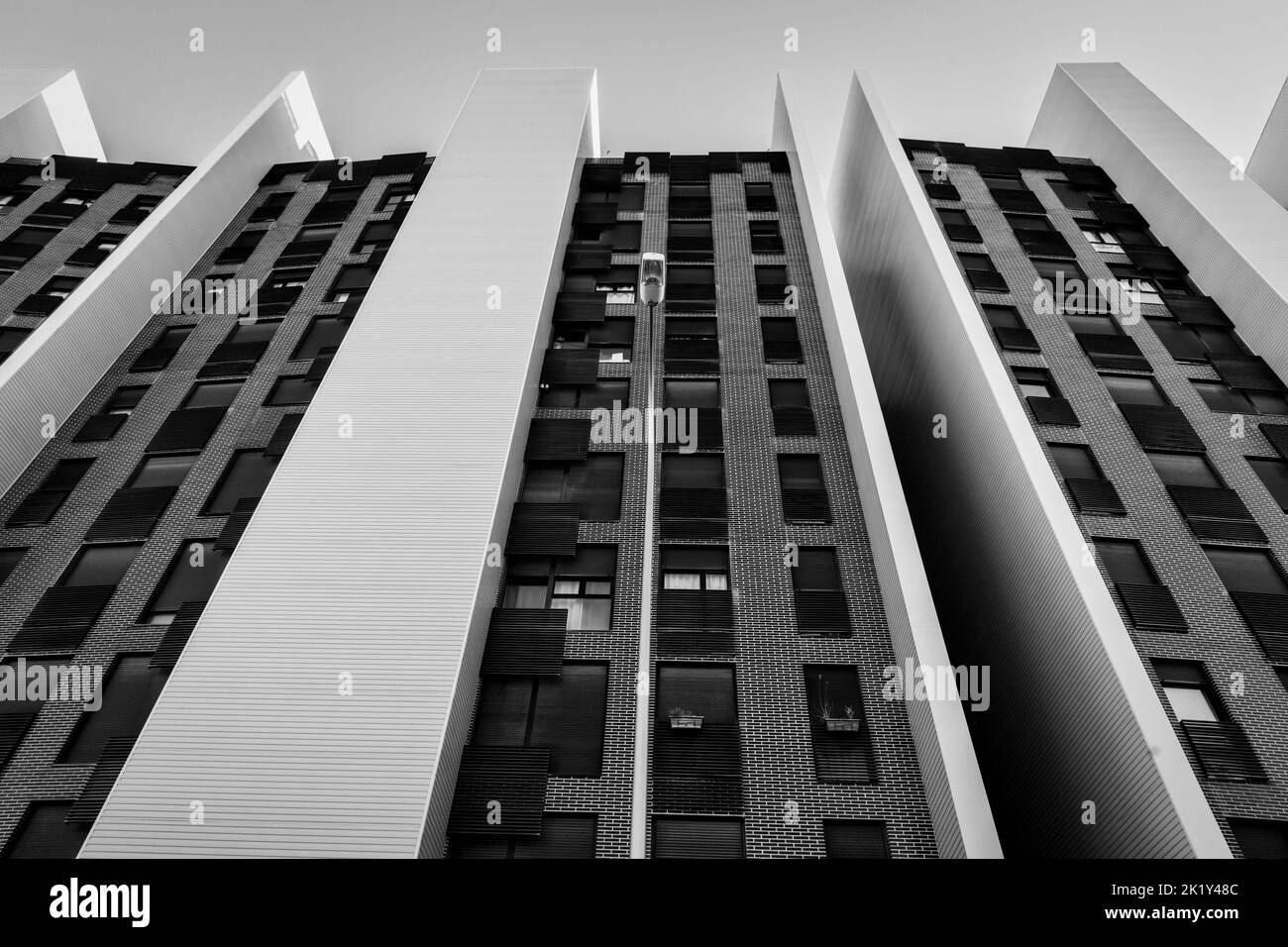 Low angle view of a block of flats in black and white Stock Photo Alamy
