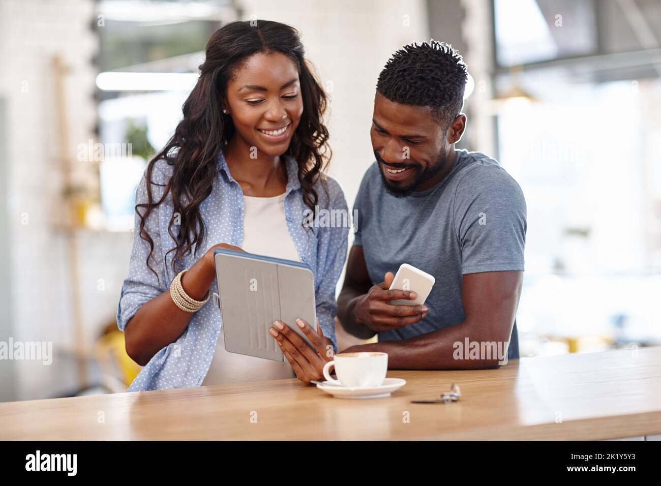 Take a look. a handsome man and an attractive female. Stock Photo