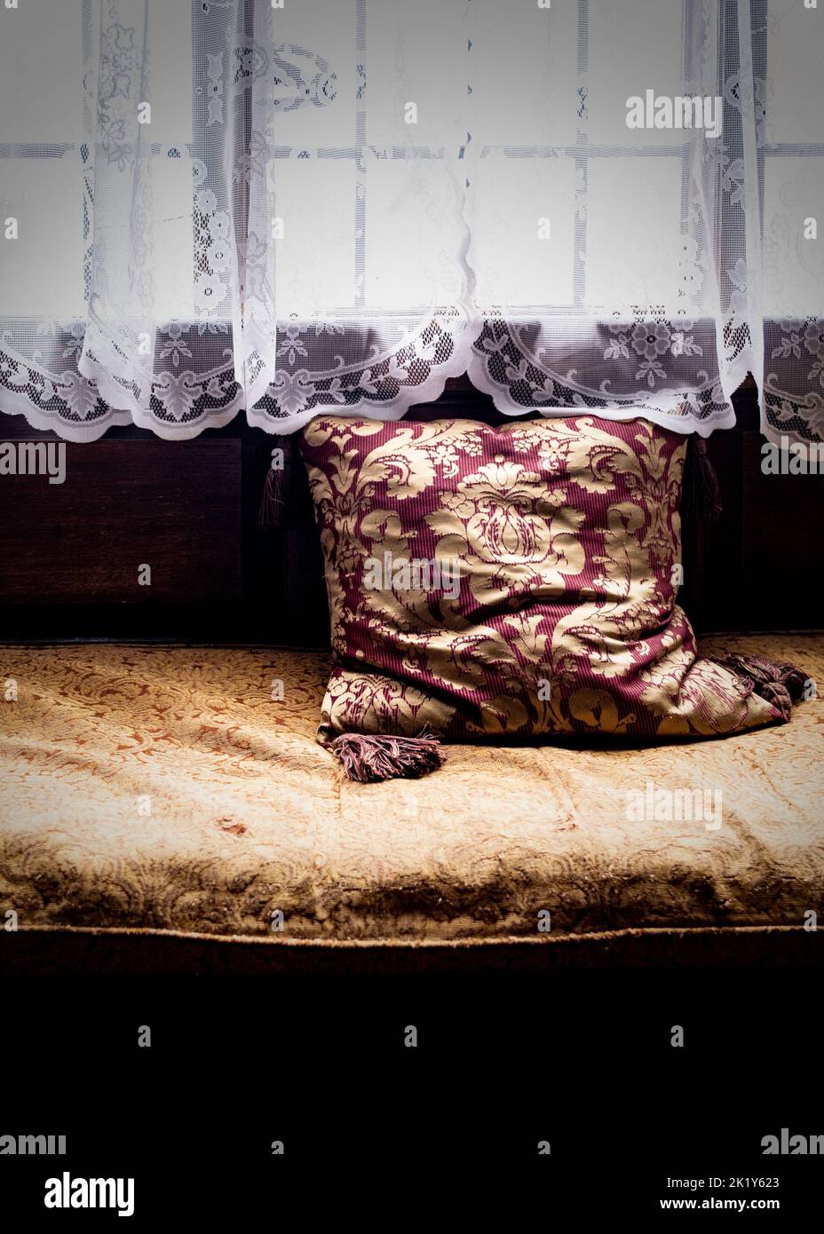 Patterned cushion on a retro bay window in an English manor house Stock Photo Alamy