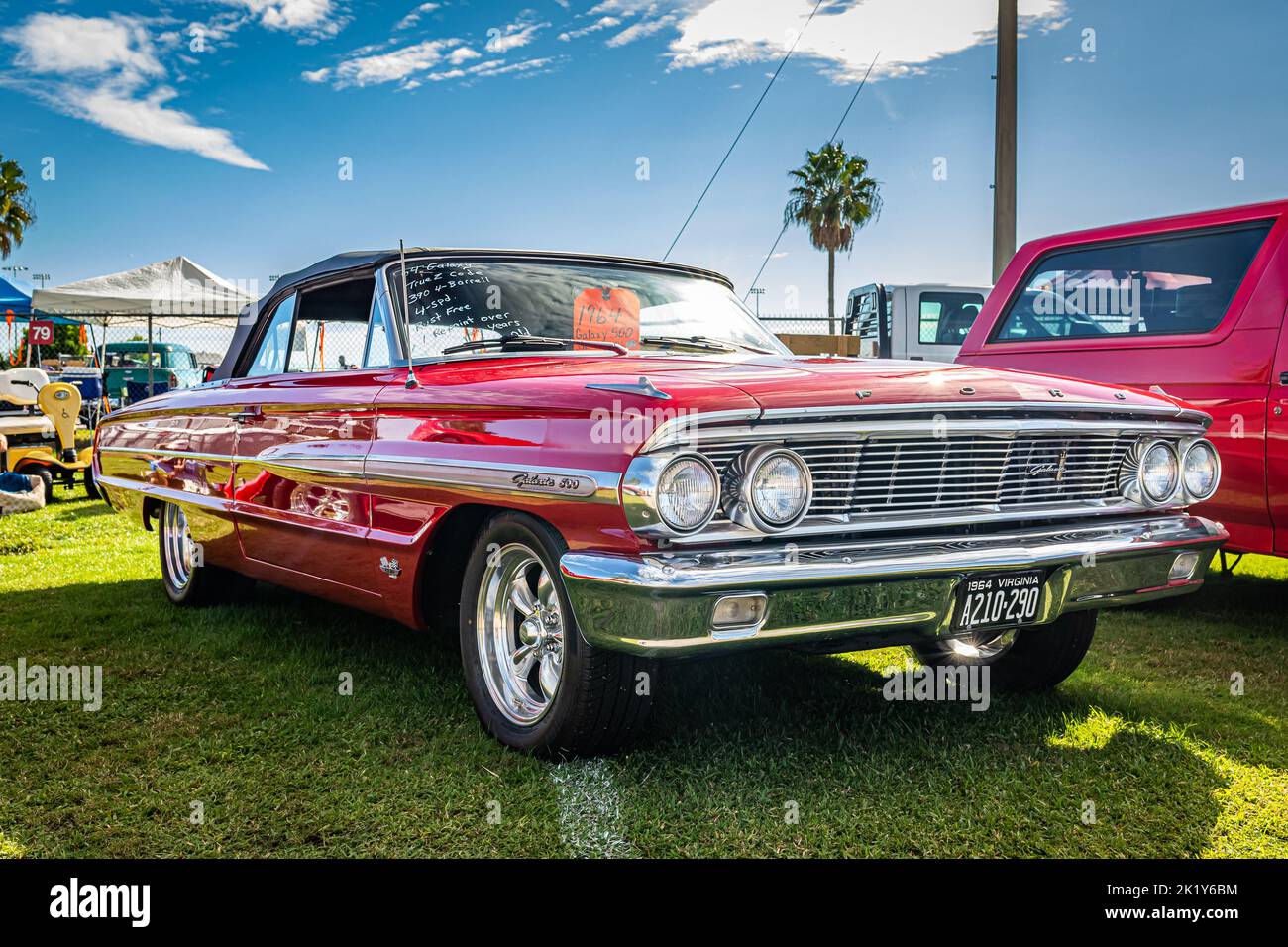 Daytona Beach, FL - November 28, 2020: Low perspective front corner view of a 1964 Ford Galaxie 500 Convertible at a local car show. Stock Photo