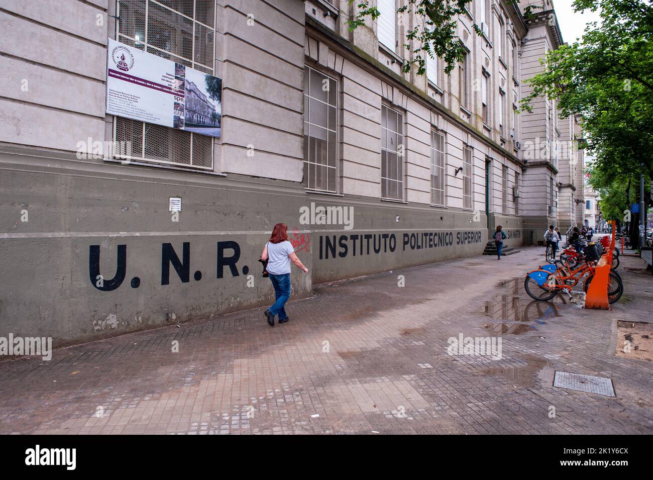 A woman walks past the prestigious Instituto Polytechnic Superior in Rosario, Argentina Stock Photo