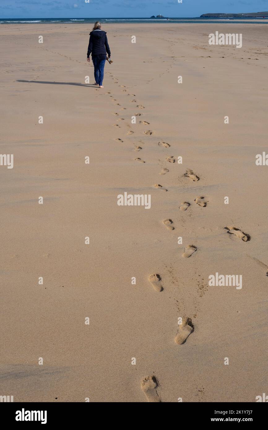 Footprints in the sand on a beach Stock Photo - Alamy
