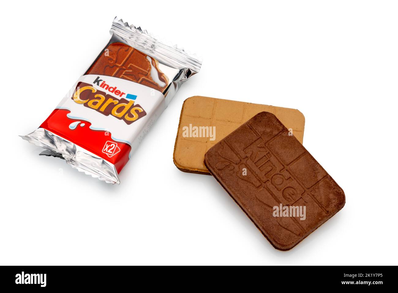 Alba, Italy - September 19, 2022: Kinder Cards: thin waffle biscuits filled with milk chocolate produced by Ferrero. Packaging with front and back coo Stock Photo