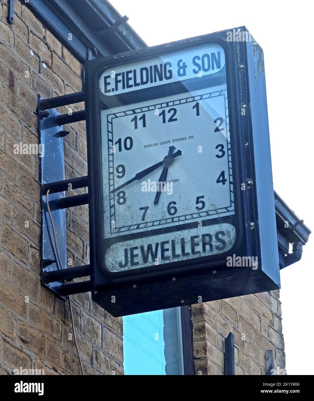 E. Fielding and Son Jewellers clock, Electric Clock Systems, 39 High St W, Glossop, High Peak, Derbyshire, England, UK,  SK13 8AZ Stock Photo