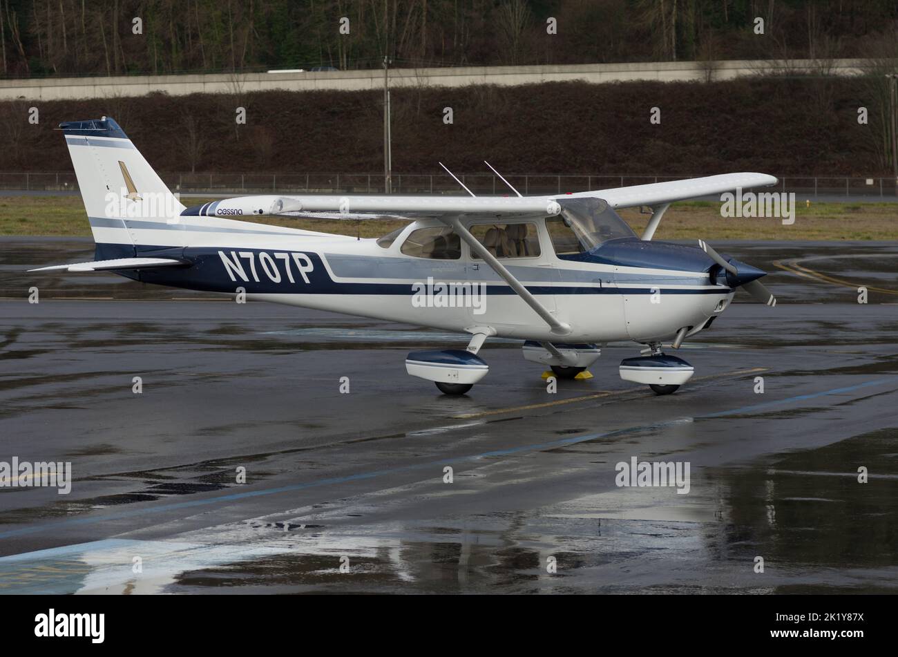 Seattle, Whasignton, Uninited States - January 16th, 2016: 1975 Cessna 172M with registration N707P shown parked on a rainy day. Stock Photo